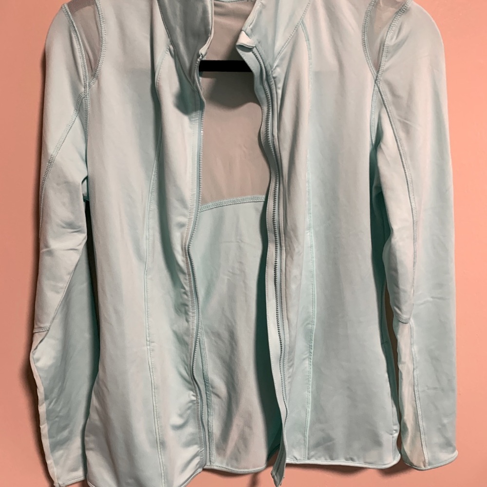 Athletic mint green zip-up jacket with mesh back